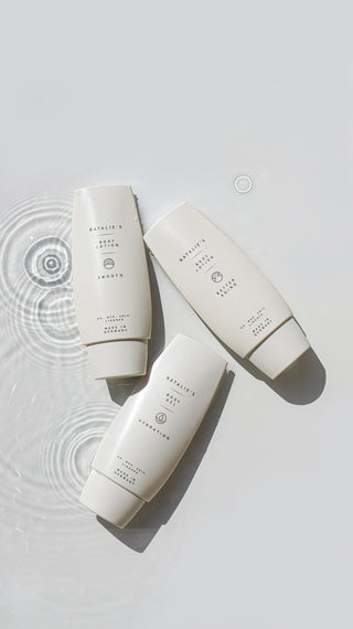 Natalie's smooth, hydration and better aging petites lying on a beige background