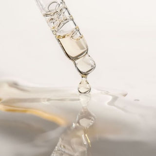 Liquid squalane coming out of a pipette