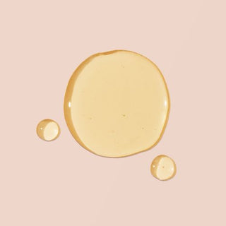 Drops of yellow Vitamin E