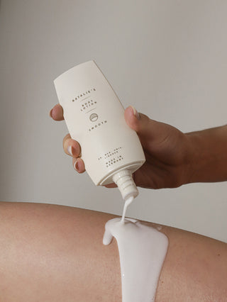 Our petite smooth body lotion being applied on a leg